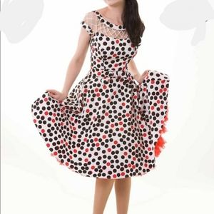 Tatyana Alika swing in red & black dots!